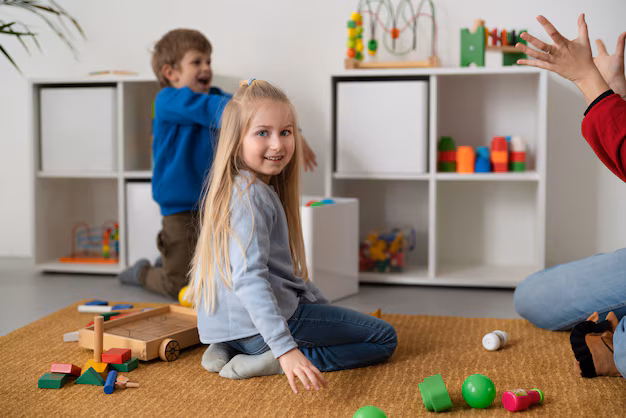 smiley-kids-with-toys-indoors_23-2149389999